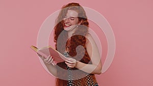 Redhead woman reading funny interesting fairytale story book, leisure hobby, education, learning