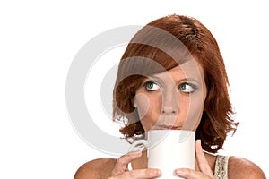 Redhead Woman Thinking With Coffee Mug