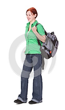 Redheaded girl backpacker photo
