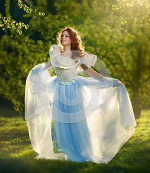 Redheaded girl in a long dress