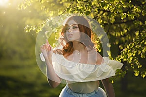 Redheaded girl in a long dress