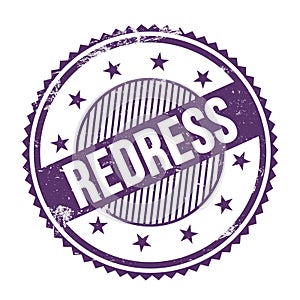 REDRESS text written on purple indigo grungy round stamp