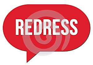 REDRESS text written in a red speech bubble