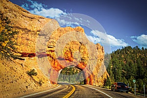 Redrock arch tunnel in Red CAnyon- unofficial gateway to Bryce Canyon National Park Utah