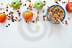 Reduce callories. Top view of muesli bowl with fresh fruits.