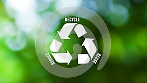 Reduce, reuse, recycle symbol on green bokeh background. Ecological and save the earth concept, An ecological metaphor for