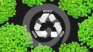 Reduce, reuse, recycle symbol on green plants background, ecological metaphor for ecological waste management and sustainable and