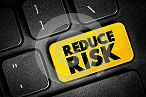 Reduce Risk text button on keyboard, concept background
