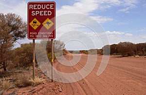 Reduce Speed Road Sign in Outback Australia..