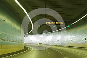 Reduce speed sign.