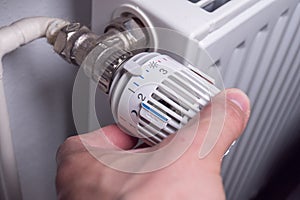 Reduce the temperature on thermostat to save energy heating costs