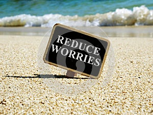 Reduce worries and stress concept. Sign on a sea cost