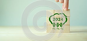 Reducing carbon emissions target in 2024. Green business.