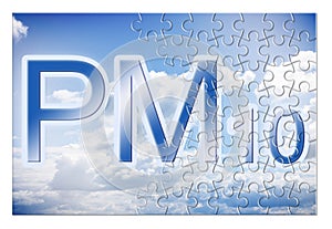 Reduction of particulate matter emission PM10 in the air -  concept image in jigsaw puzzle shape photo