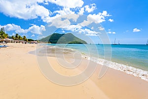 Reduit Beach - Tropical coast on the Caribbean island of St. Lucia. It is a paradise destination with a white sand beach and