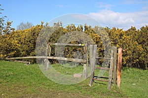 Redundant stile, old fence on countryside footpath