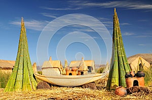 Reed boat on Island of Uros. Titicaca Titiqaqa is a lake in the Andes on the border of Peru and Bolivia photo