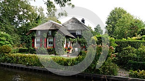 Reed farm house in romantic water village Giethoorn in the Netherlands