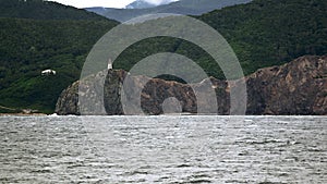 reef with a lighthouse photo