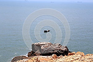 Reef rock in the coast of meizhou island photo