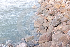 Reef in sea rocks with wind blows be sea waves