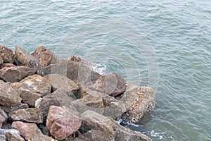 Reef in sea rocks with wind blows be sea waves