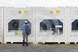 New manufactured shipping reefer container is plugging to keep cargo fresh in the container photo