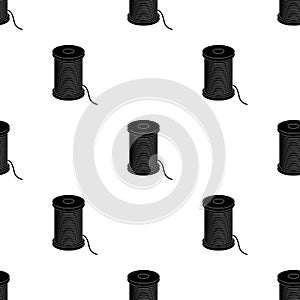 A reel of blue thread.Sewing or tailoring tools kit single icon in black style vector symbol stock illustration.