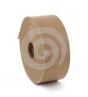 Reel with brown paper stickers labels isolated on the white background. Labels for thermo printer for bar codes to mark goods.
