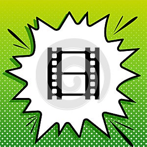 Reel of film sign. Black Icon on white popart Splash at green background with white spots. Illustration