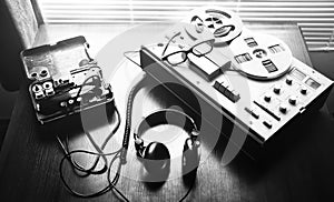 Reel tape recorder for wiretapping . Field telephone set USSR is lying nearby.  KGB spying conversations