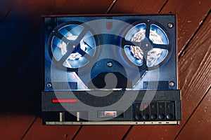 reel to reel audio tape recorder with blue led light strip