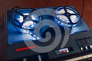 Reel to reel audio tape recorder with blue led light strip