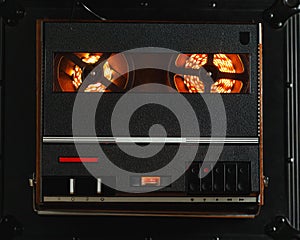 Reel to reel audio tape recorder with orange led light strip