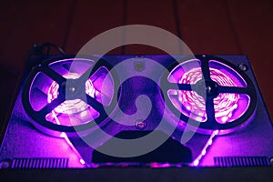 Reel to reel audio tape recorder with purple led light strip