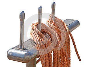 Reeled ship ropes hanging on white