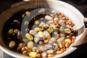 Reeling silk from cocoons