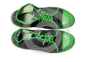Reen athletic shoes on a white background