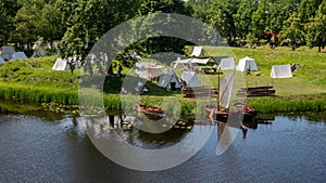 Reenactment of Bourtange 1650 army camp outside of the city with an old boat in the river