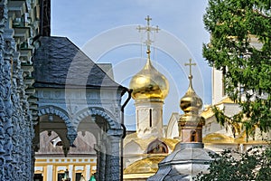 Refectory Porch and Golden Church Domes Framed by Trees