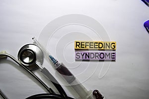 Refeeding syndrome text on top view  on white background. Healthcare/medical concept