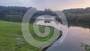 Refelction of collored sky in the lake