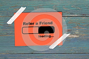 Refer a friend loading on paper