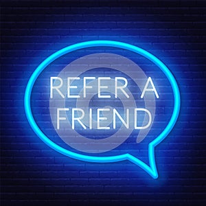 Refer a friend neon sign in a speech bubble frame on a brick wall background. Template for referral program photo