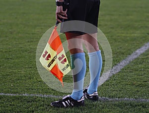 Referee assistant during a football game