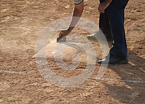 Referee on home plate baseball or softball field