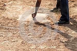 Referee on home plate baseball or softball field