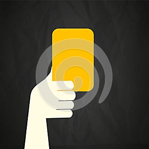 Referee showing yellow card