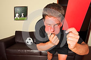 Referee in sitting room blowin
