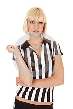 Referee woman serious one arm up